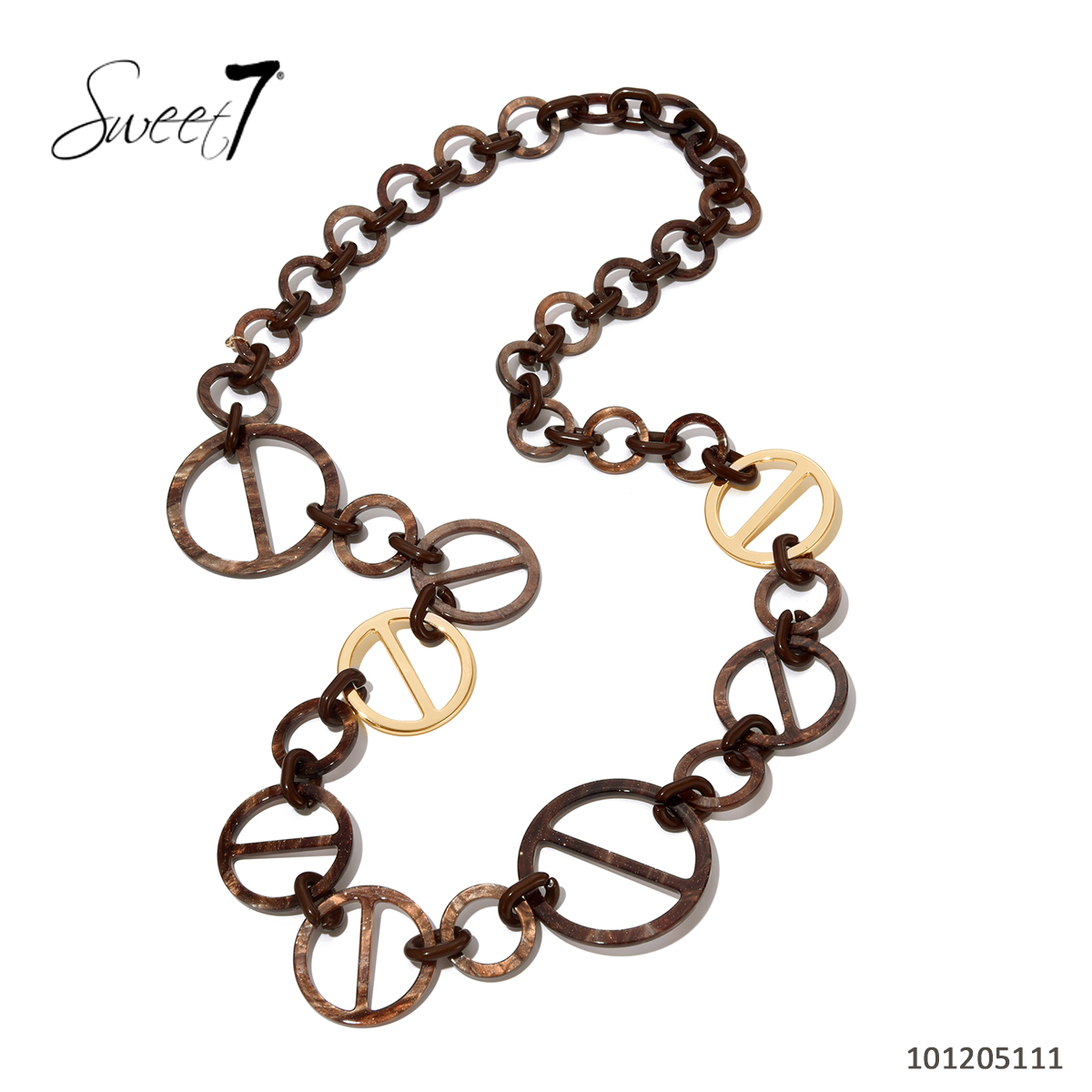 Sunny Mode GmbH - Junge Mode aus Paris | Kette Sweet7 | Artikel-Nr. 101205111 | Diese moderne Halskette von Sweet7 besteht aus brauen Rundelementen mit markanten Querstreben und wird durch goldfarbene Details stilvoll ergänzt. Ihr ausgefallenes Design macht sie zum perfekten Accessoire für trendbewusste Outfits. | Kategorie: Schmuck / Ketten | Angebot: Damenbekleidung, Damen Accessoires, Große Größen, Young Fashion, Sofortprogramme | Adresse: Sunny Mode GmbH - Kölner Str. 1 - 65760 Eschborn - Tel: 06196 483138 - info@sunnymode.de